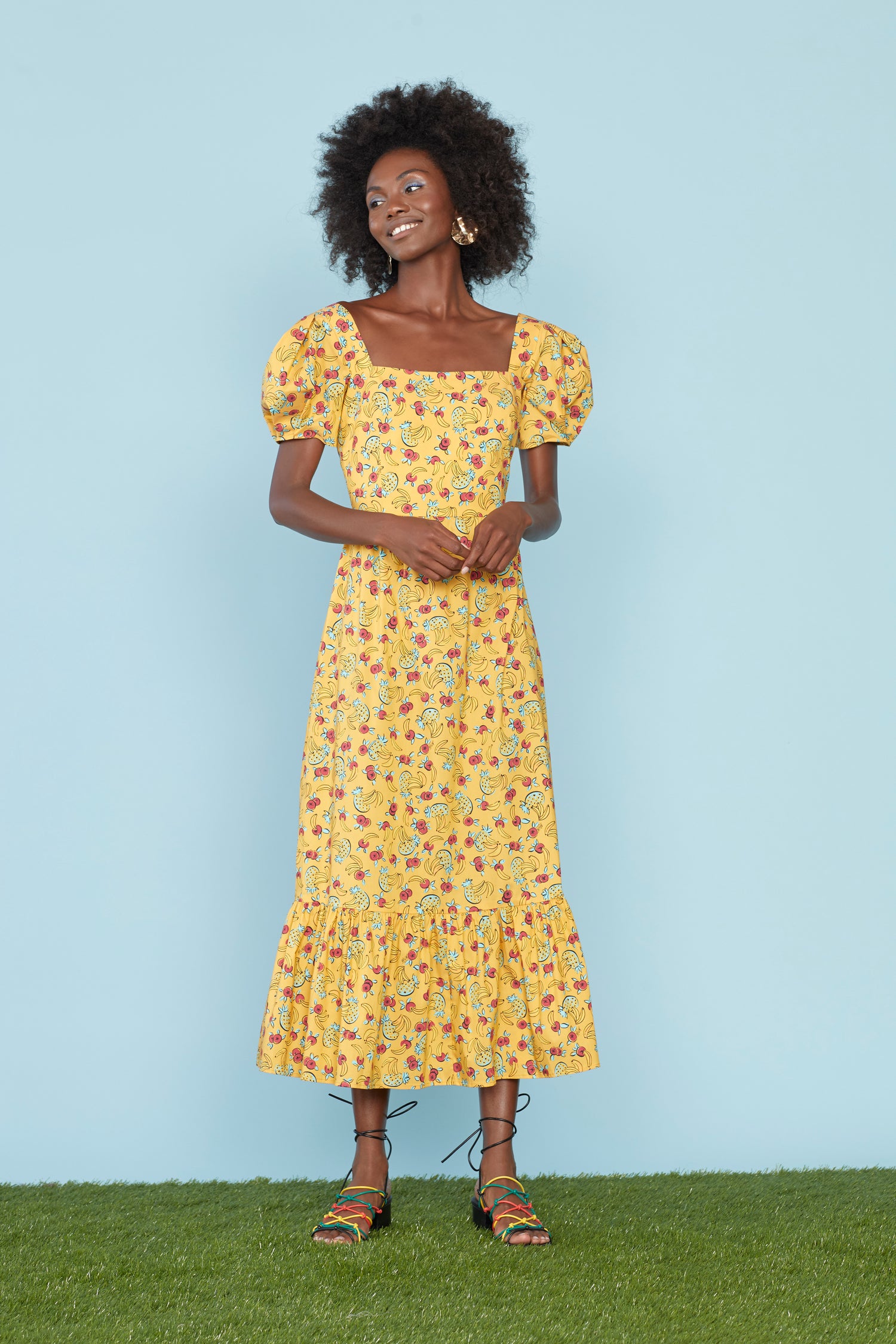 A model wears the Cotton Fromer Dress