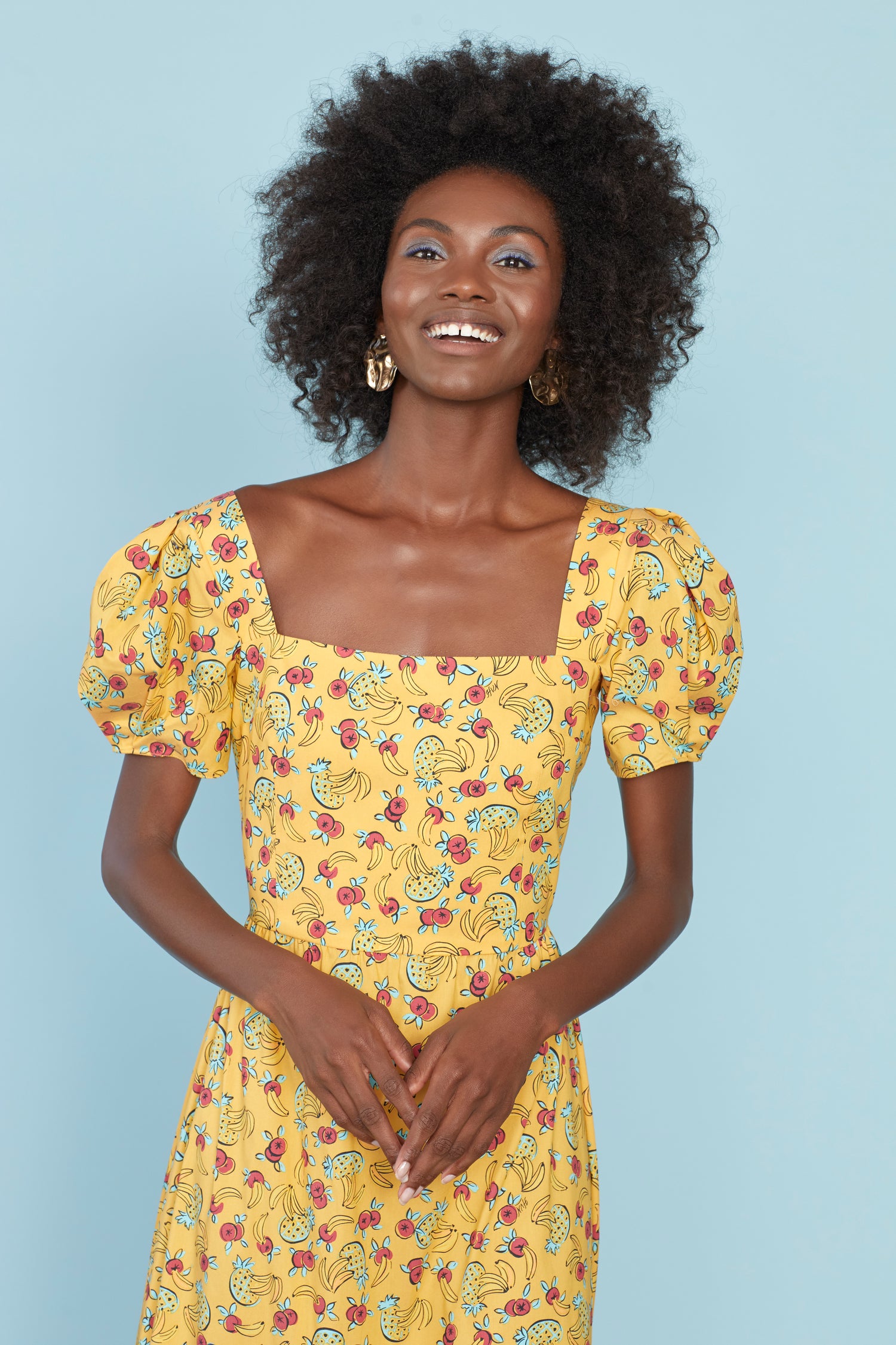 A model wears the Cotton Fromer Dress